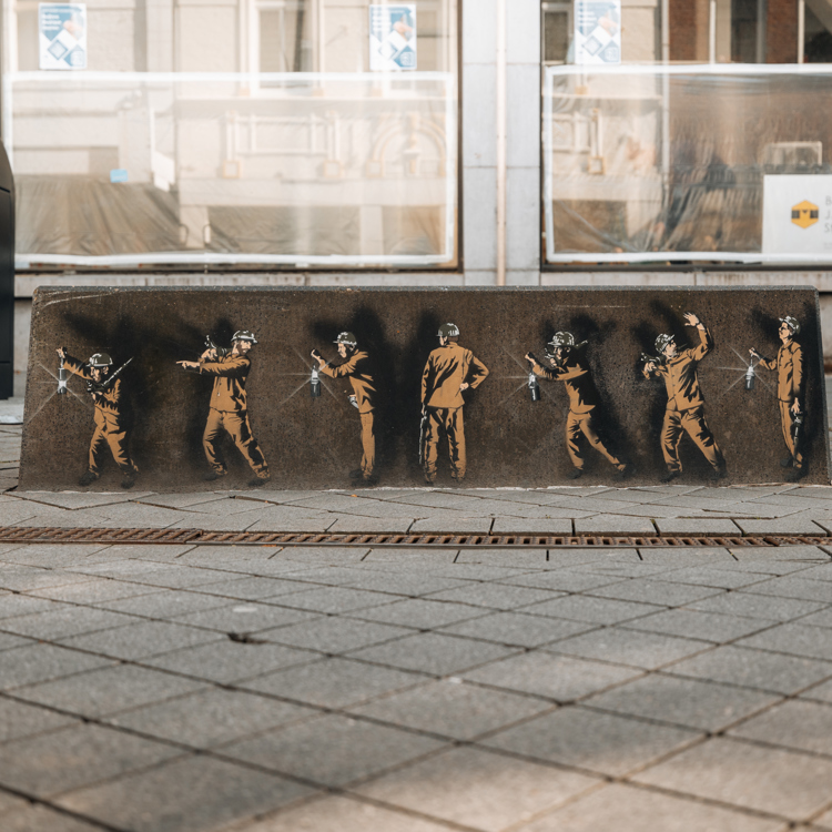 Streetart muurschildering van mijnwerkers in Heerlen.