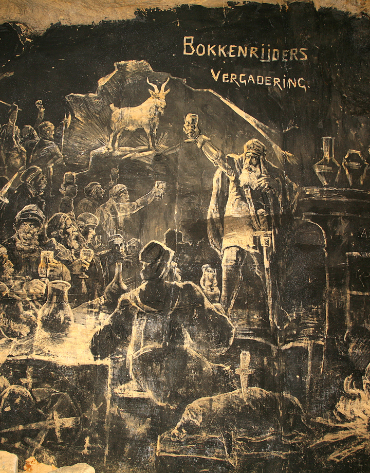 Houtskool muurschildering van Bokkenrijdersvergadering in grot